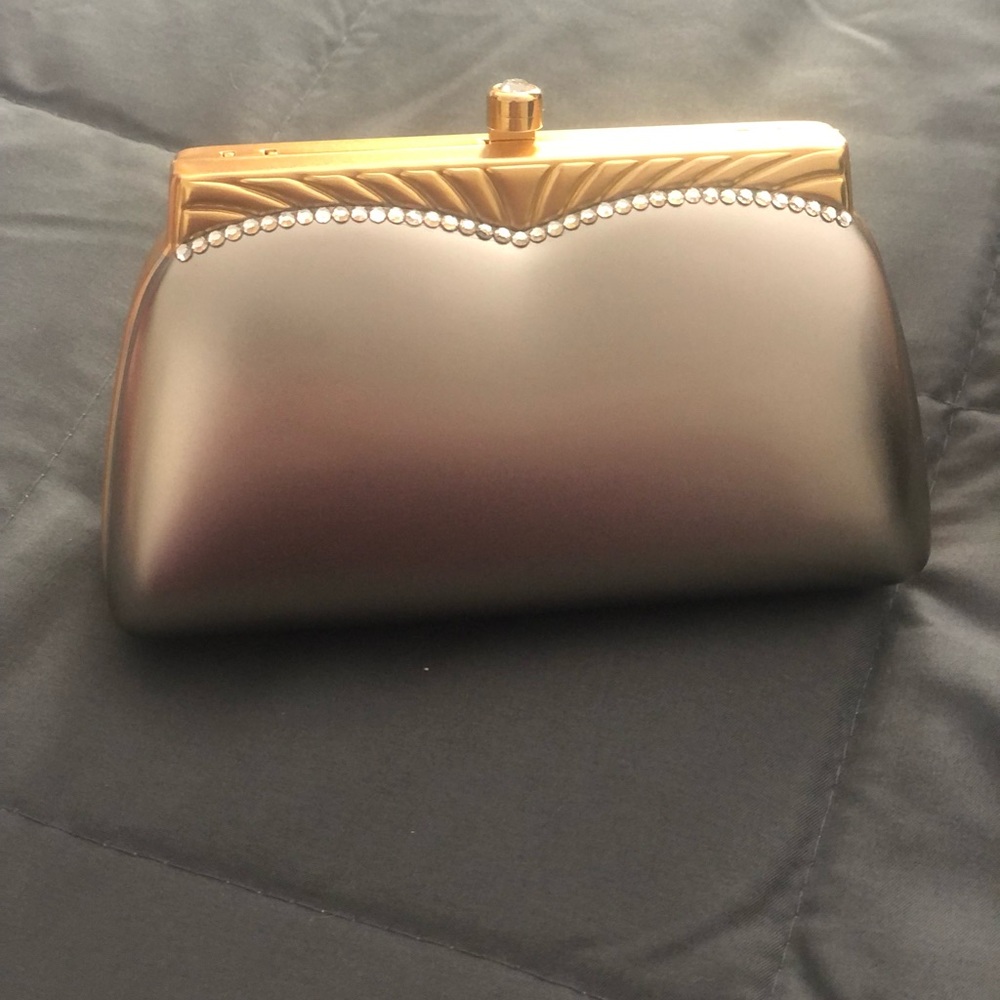 silver and gold metal purse